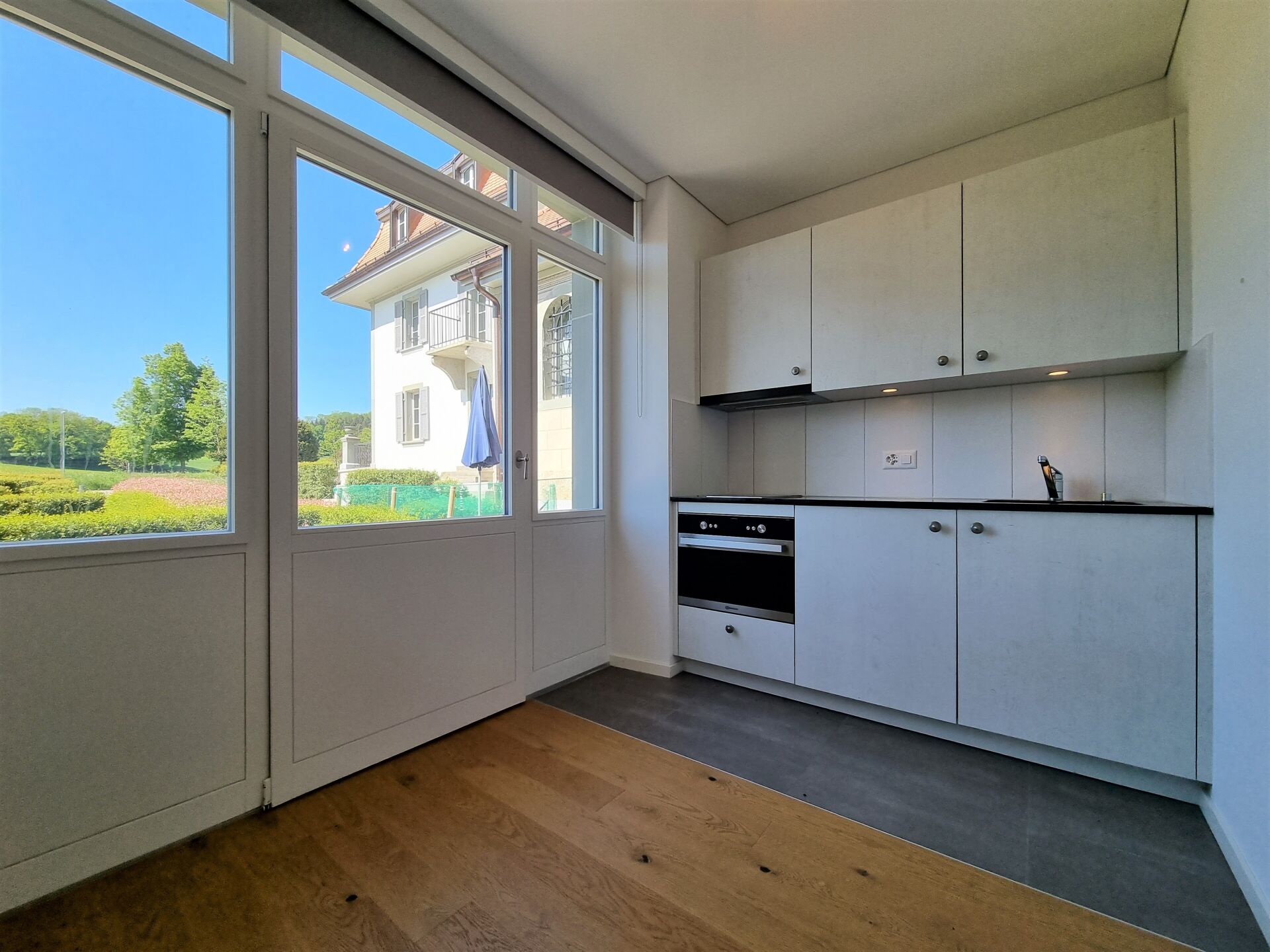 Belfaux – Appartement de 2 pièces au rez-de-chaussée avec terrasse et jardin